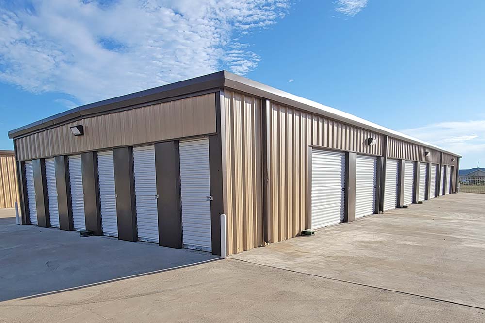 Outside of Self-Storage facility showing doors of climate-controlled units in Bonham